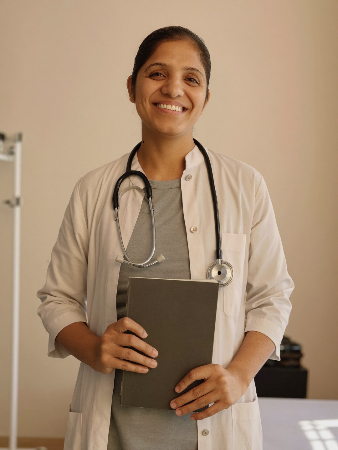 Dr. Varsha, doctor and postpartum recovery coach