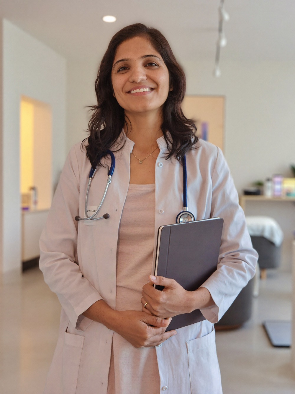 Portrait of Dr. Varsha, co-founder of postpartum recovery at Moves n Stretch