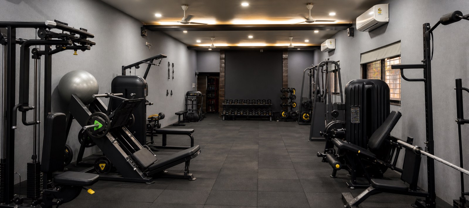 The Moves n Stretch studio training floor with machines and free weights